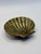 Beautiful vintage brass seashell catchall dish featuring sculptural ridged detailing and a richly aged patina throughout....