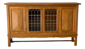 In Style of Henning Kjærnulf Oak Sideboard Credenza With Carved and Leaded Glass Doors Danish Mid-Century Modern 1970s