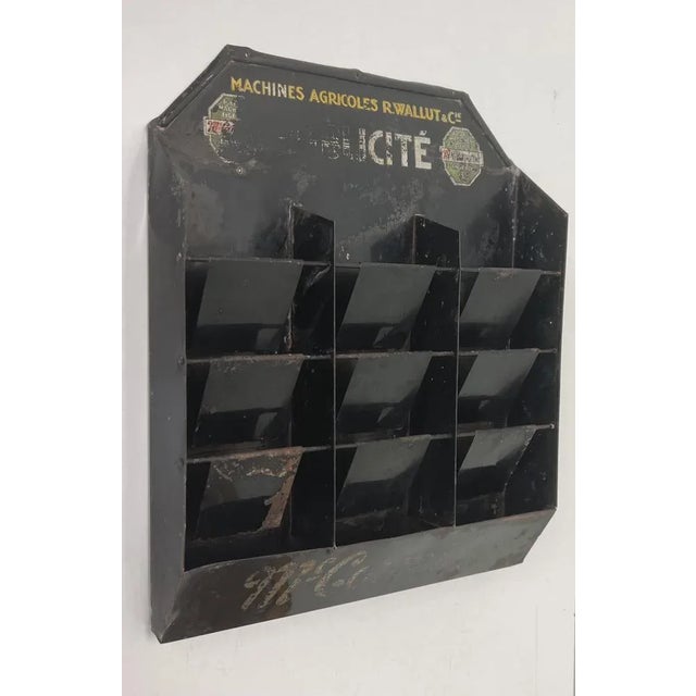 Very unique wall rack from an agricultur machinery workshop by Mc.Cormick/ R.Wallet & Cie, around 1900 France. The rack...