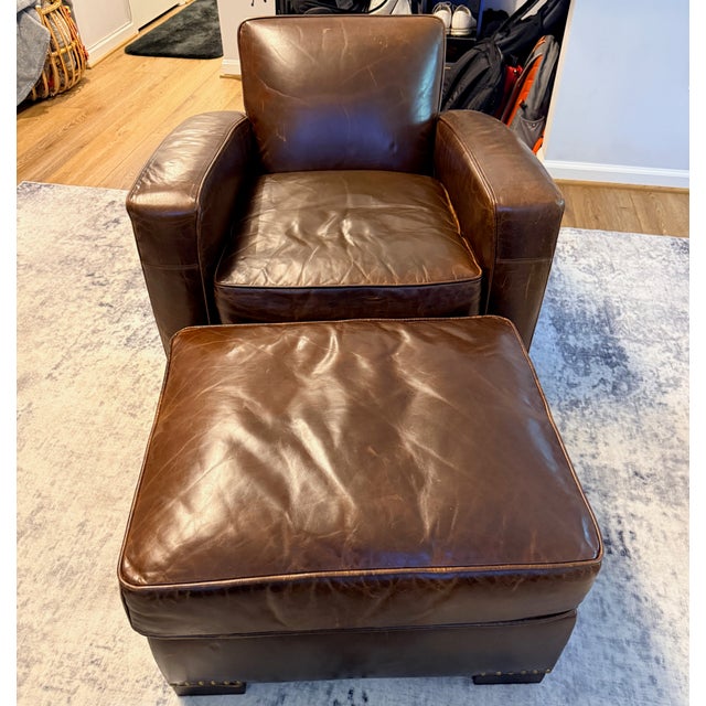Restoration Hardware Library Chair with Ottoman The Library Chair is made in cocoa brown Italian Bromptom leather. Modeled...