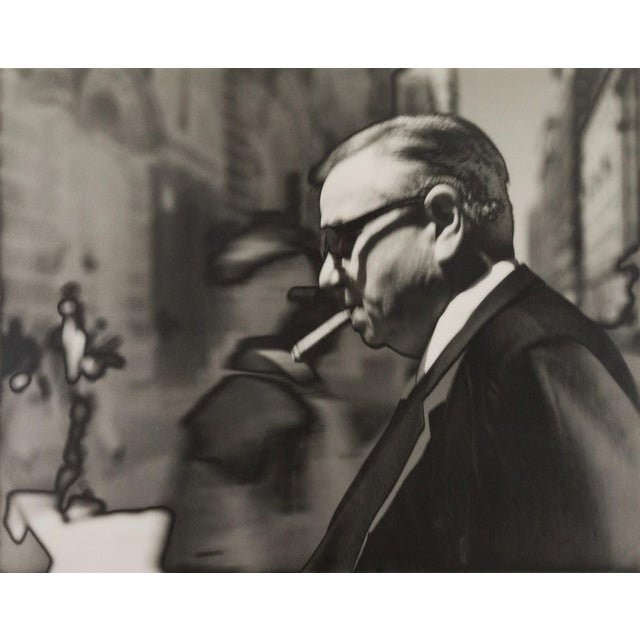 A solarized gelatin silver print titled "Man with Cigar, 1986" by Michael Spano. Signed on verso. Edition of 2 out of 25....