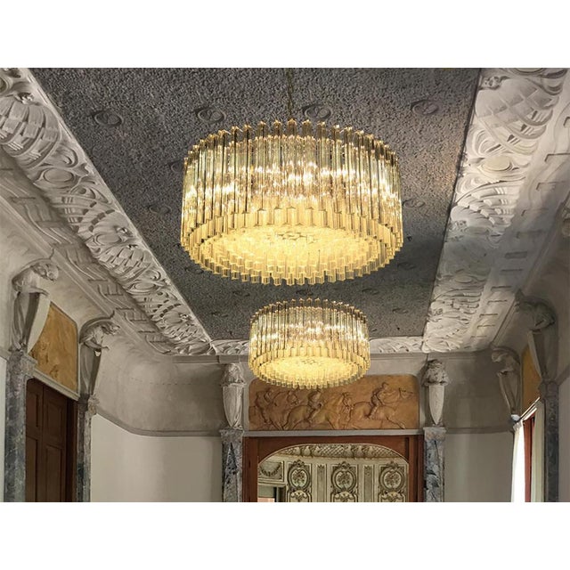 Pair Triedri Murano glass chandeliers, 265 trasparent prism A magnificent Murano glass chandelier, 265 pink triedri on...