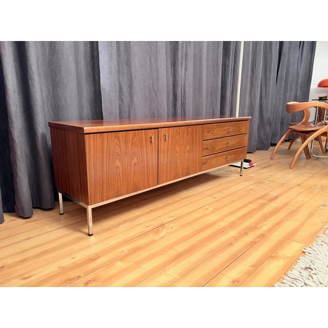 Sideboard from the 1970s. In very good original condition. Minor signs of wear. High-quality workmanship with chrome-...