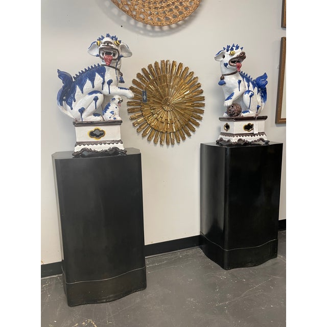 Nice pair of vintage Palm Beach Regency display pedestals in original black lacquer finish. Perfect to display your...