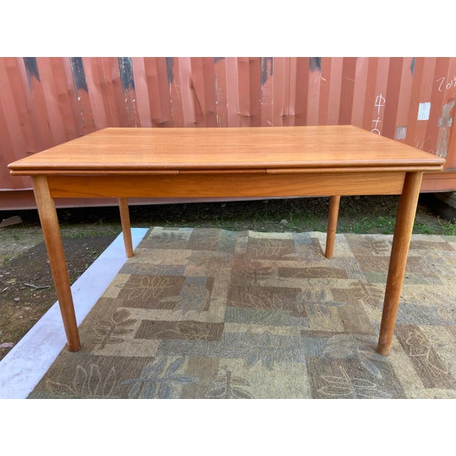 Vintage modern Ansager Mobler teak danish extendable table with hidden leafs in good condition some surface scuffs, could...