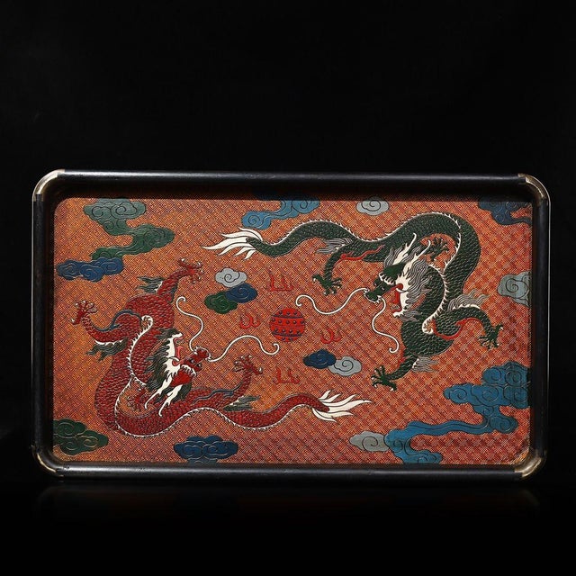 This is a striking and substantial vintage rectangular tray, crafted with a dark ebony wood (黑檀木) frame and a vibrant...