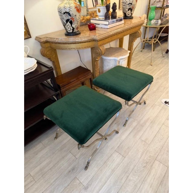 This is a pair of tables that we had retrofitted into ottomans. They came with glass tops and have seen top designers turn...