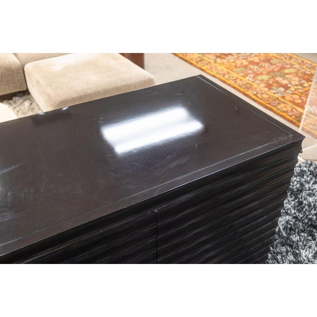 A Barbara Barry for Baker fluted sideboard credenza. This lovely modern cabinet features a wonderful fluted exterior...