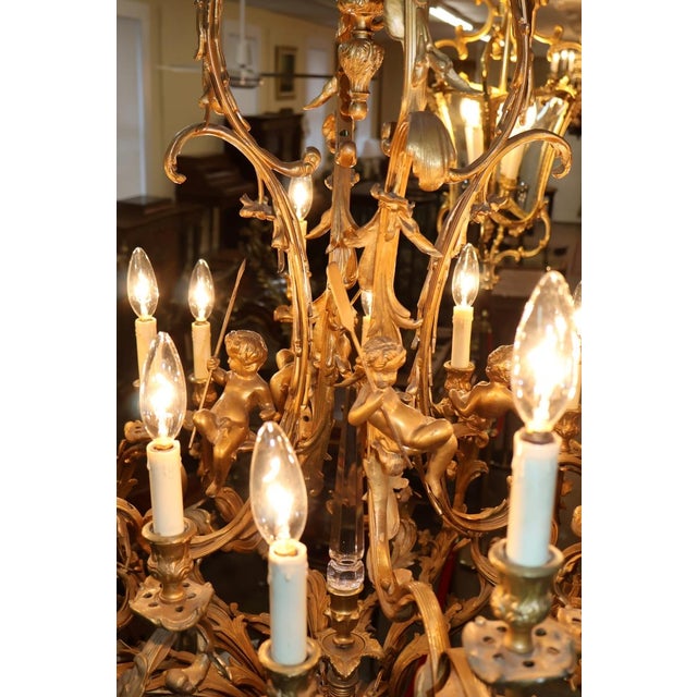 Early 20th Century French Rococo Style Gilt Bronze Putti 16 Light Chandelier For Sale - Image 9 of 18