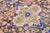 Beautiful vintage Persian distressed hand-knotted wool rug with a blue color field. This piece has a beige frame and...