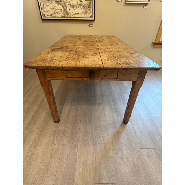 For sale in Sunapee Harbor is an amazing Irish Pine Farm Table with a knife drawer. This piece came from amazing local...