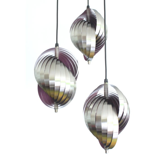 Vintage cascade pendant light from the 1970s, Lyfa Denmark. Each light is crafted with interlocking stainless steel...