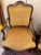 A pair of faux Louis XV armchairs in fully carved walnut, circa 1800 Abundant carved decoration Upholstered in the style...