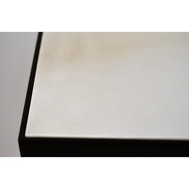 Chic 'Esquisse' wrought Iron and ivory parchment console by Design Frères. Contrasting ivory goat parchment top over...