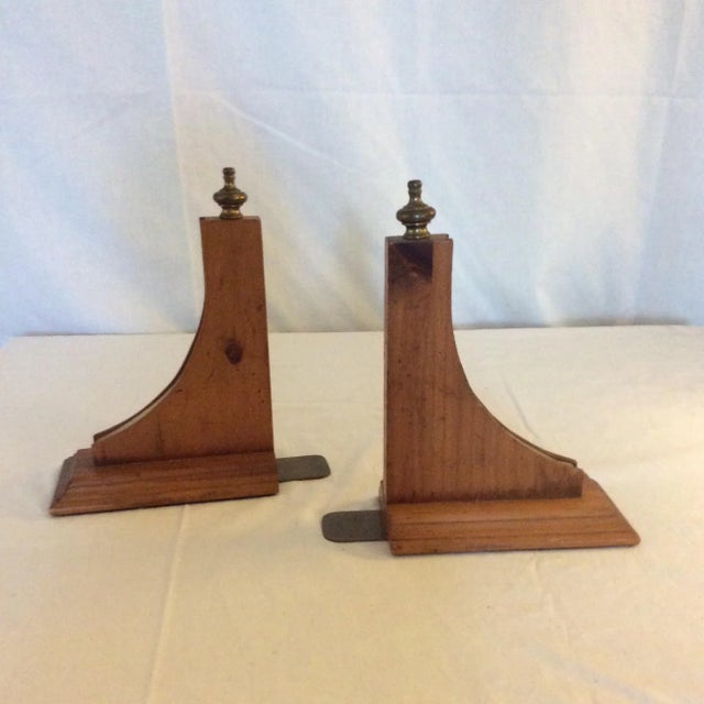 Pine and brass decorative book ends