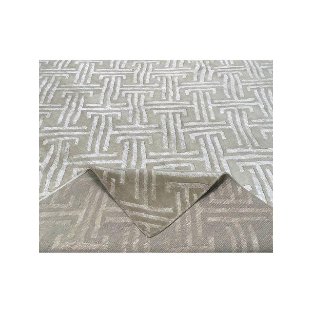 Exact Size: 8'3" x 10'3" Color: Gold Age: New Materials: Wool, Bamboo Silk Construction: Hand Knotted Origin: India