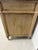 A handsome French Louis XVI style commode distinguished by its strong architectural form and beautifully timeworn bleached...