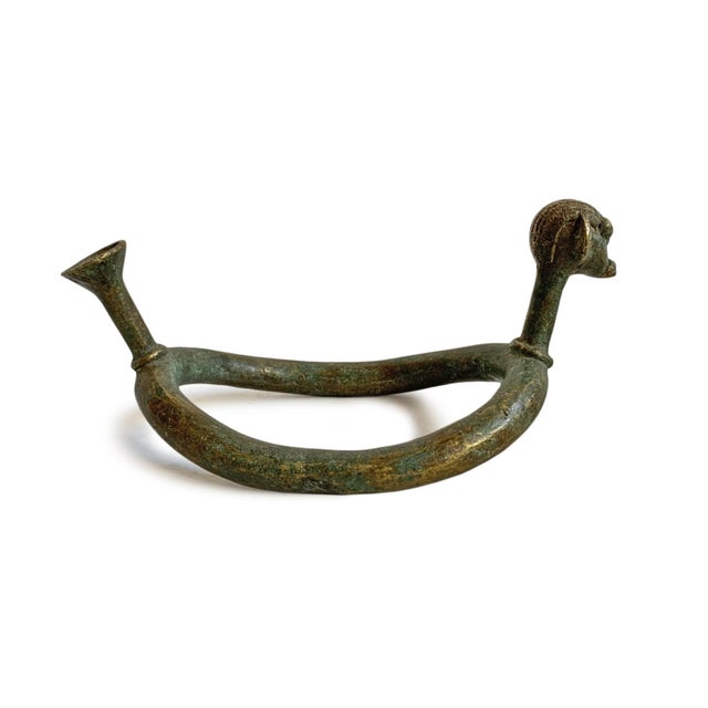 Original antique bronze figurative ankle piece from the Lobi people of Burkina Faso. Beautiful aged patina and makes a...