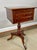 A fine English Regency period work or sewing table, crafted in quilted mahogany with rosewood crossbanding. The drawer is...
