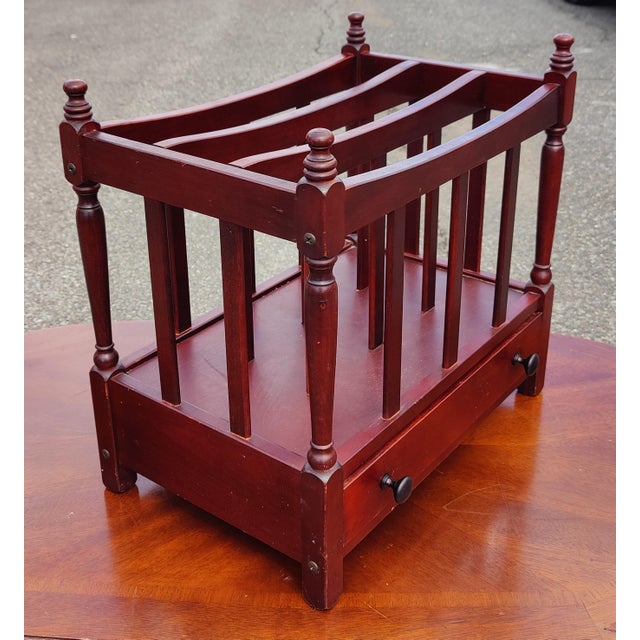 Vintage Canterbury magazine rack with drawer. Mahogany finish. It is beautiful piece wood furniture for your living room....