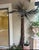 Striking large-scale 1970s artist-made palm tree wall sculpture crafted in copper and brass. The piece has a dramatic...