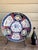 An antique Japanese Imari porcelain charger, likely originating from the Meiji period (late 19th century to early 20th...