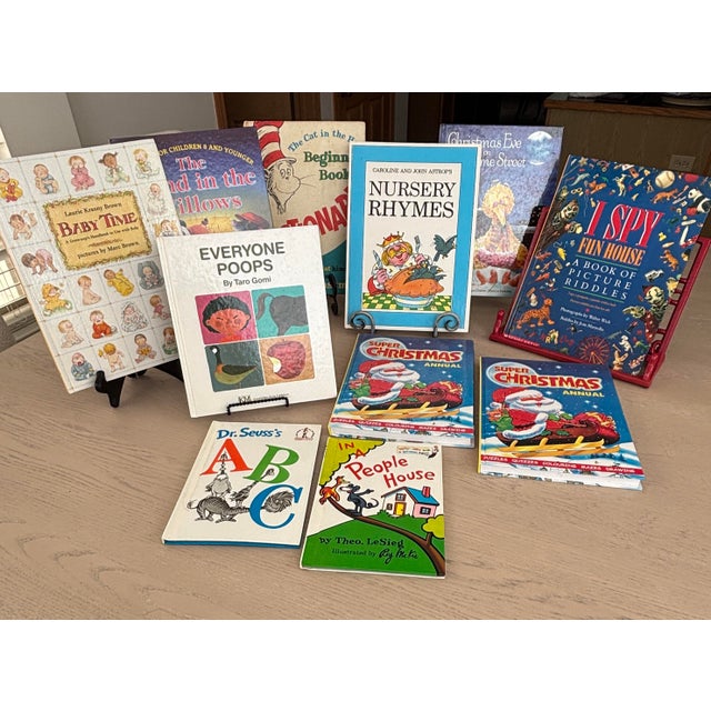 Curate a luxury nursery, playroom, or mid-century bookcase with this pristine 11-piece collection of classic and highly...