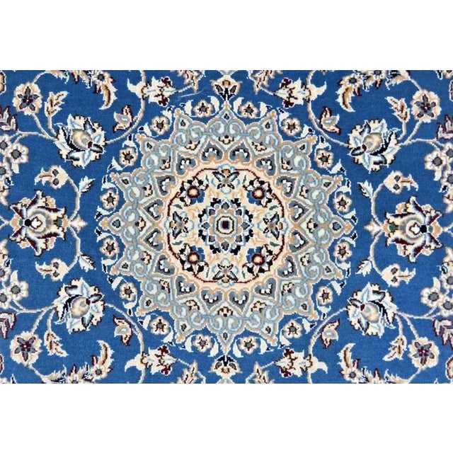 Hand-knotted Nain oriental rug | Knot density: 350.000 – 400.000 | Material: Pile: 100% virgin wool with silk content,...