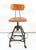 Vintage industrial drafting stool, manufactured by the Toledo Metal Furniture Co. during the 1930s and 1940s. It has a...