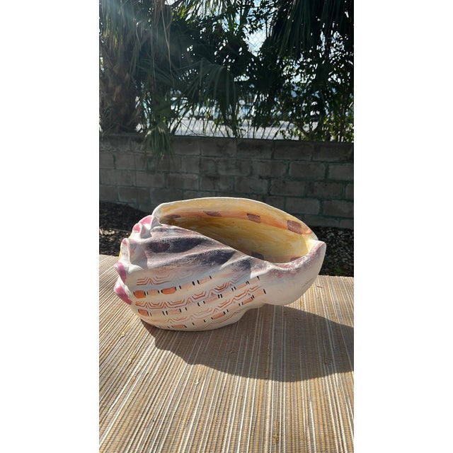 Vintage large painted ceramic shell. Signed "Hilda Mexico", part of a group of vintage hand painted ceramic shells from...
