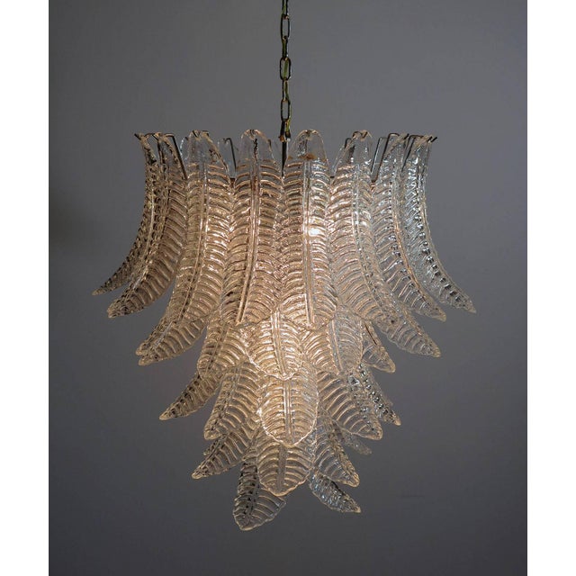 Pair of beautiful and huge Italian Murano chandeliers each composed of 52 splendid transparent glasses that give a very...