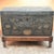 Of museum quality ! An exceptional dome top wood leather wrapped trunk with amazing nailhead decoration depicting florals...