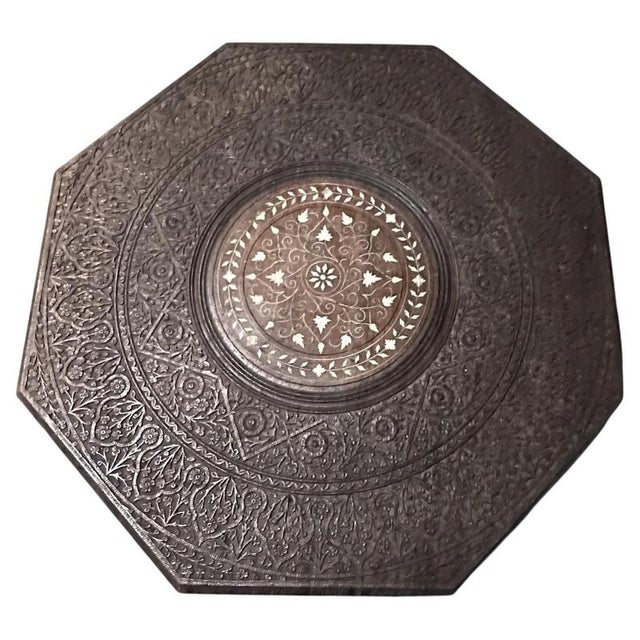 A highly decorative Anglo-Indian occasional table, finely crafted from dark rosewood and displaying an impressive...