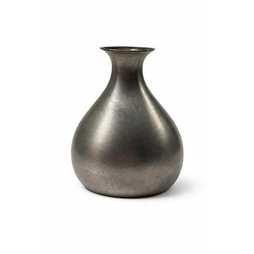 Refined swedish modern pewter vase produced by gab (guldsmedsaktiebolaget), sweden, 1950. The vase features a beautifully...