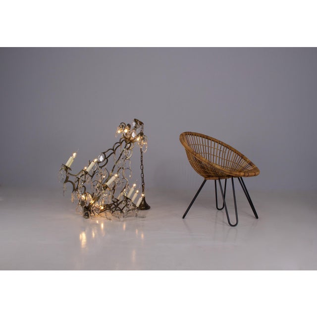 Large chandelier in 10 arms of light bronze cage garnished with bevelled crystal pampilles, 20 lights divided into two...