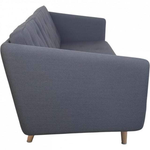 Børge Mogensen No. 1 three-seater sofa upholstered in grey Breeze Fusion fabric, and with legs of oak. The sofa is from...
