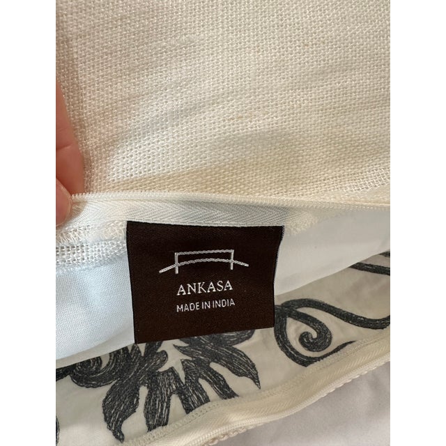 Elevate your space with this luxurious set of three designer pillows by Ankasa, known for their exceptional craftsmanship...