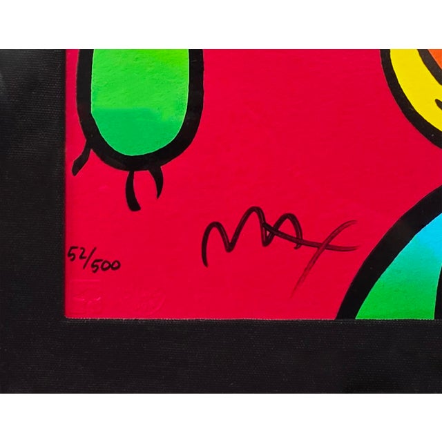 Serigraph in colors on paper. Hand signed lower right by Peter Max. Hand numbered 52/500 lower left. Sheet size: 16 x 14...
