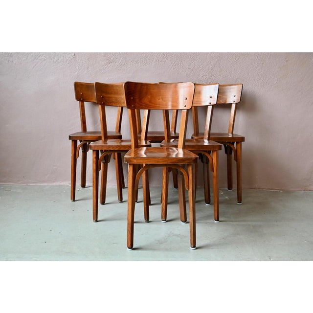 In the tradition of Baumann chairs, this set of six from the 1960s had everything to charm us! Here is a series of bistro...