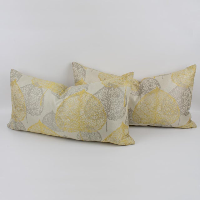 This is a lovely set of two damask throw pillows. These lumbar pillows are covered with a textured naturalist design in...