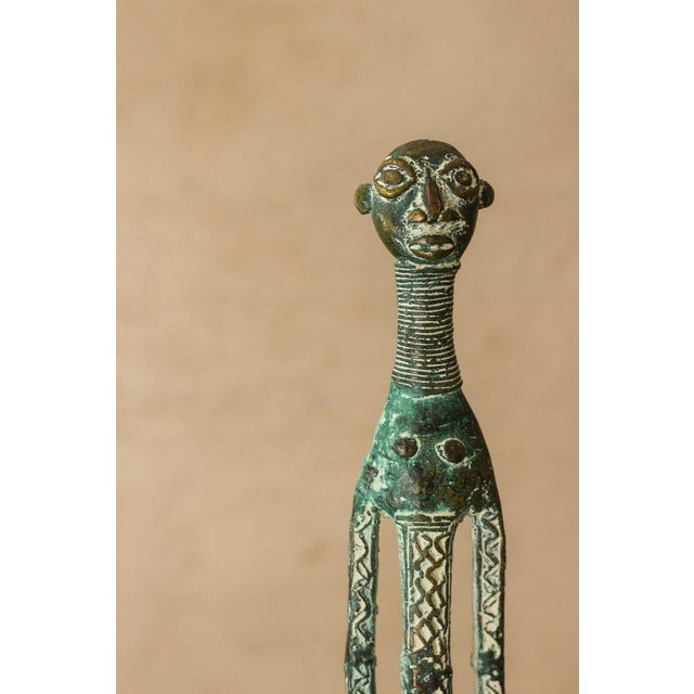 Benin bronze objects, were used in West Africa as a form of currency and thus status. Their value lies in both the metal...