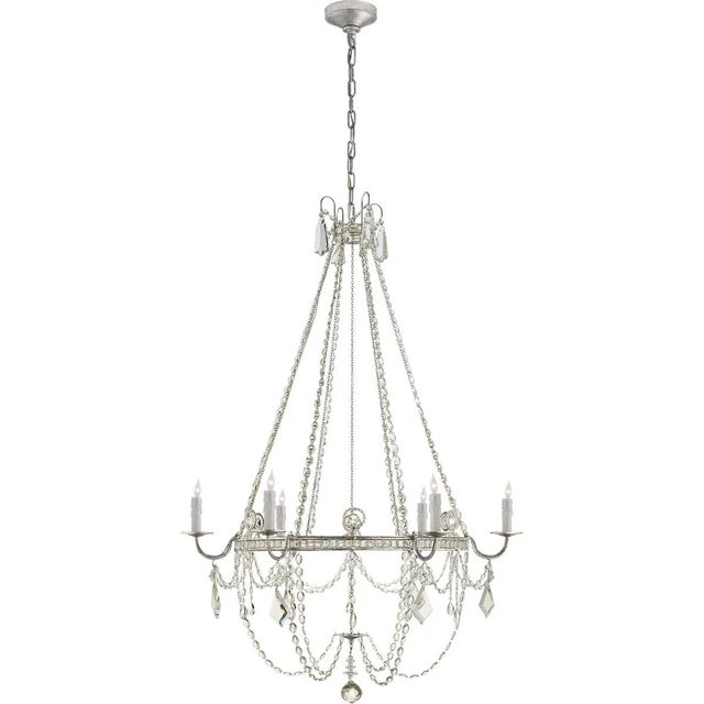 Sharon Medium Chandelier in Burnished Silver Leaf with Crystal Trim Designer: J. Randall Powers Canopy: 6" Round Mounting:...