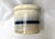 Vintage stoneware crock. Love the blue stripe with the color bleeding into the glaze. Wide mouth and short stature make...
