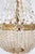 It looks to be of excellent quality. The brass and crystals are perfect. It uses three E27 bulbs. European Plug (up to...