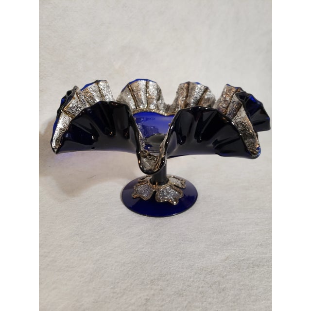 Up for consideration is one very beautiful cobalt blue Moroccan cobalt blue footed ruffle bowl. The base shows remnants of...