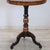 Bbeautiful small round table in 19th-century Italian walnut. This extremely refined table features an elaborate wood inlay...