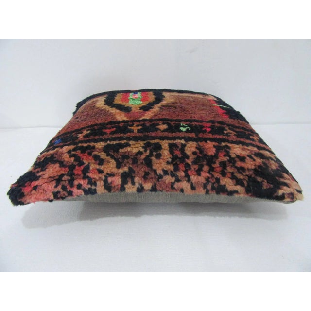 Decorative pillow cover made from a vintage Turkish handknotted rug. Backed with good quality cotton fabric. Pillow...