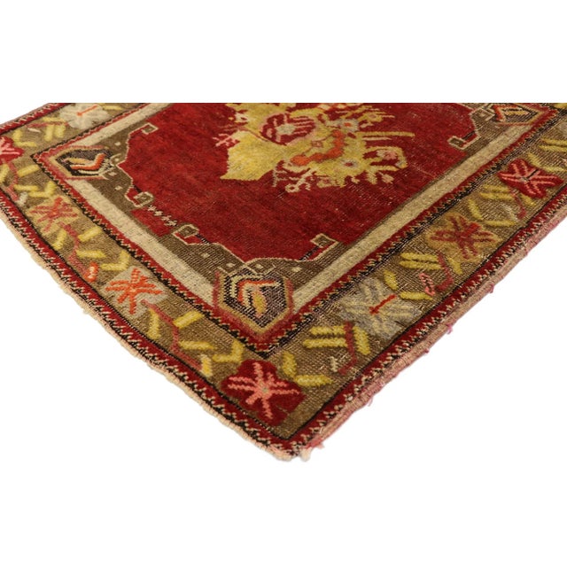 51195 Vintage Turkish Yastik Rug, 02'02 x 02'04. This hand-knotted wool vintage Turkish Yastik rug is a vibrant tableau of...