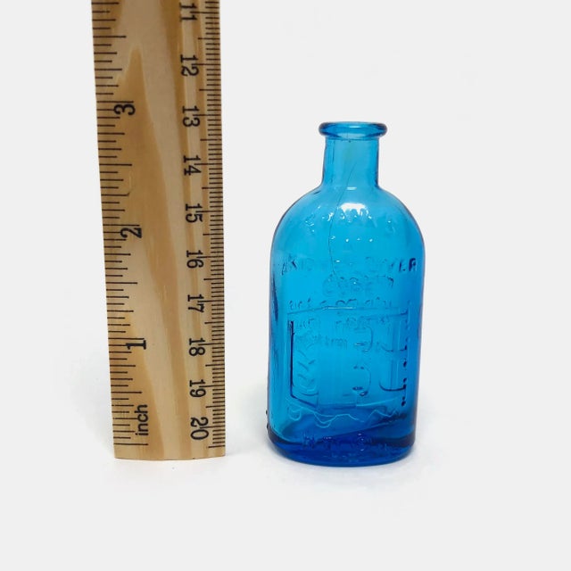 This vintage Wheaton "Frank's Safe Kidney Liver Cure" miniature glass bottle is in good condition as pictured with no...