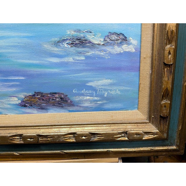 A luminous original coastal landscape by listed American artist Audrey Myrick, this serene seascape captures the timeless...